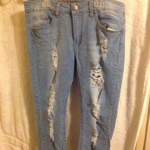 RIPPED BLUE JEANS